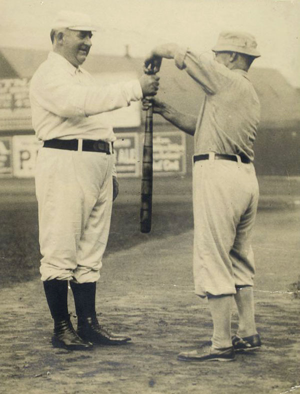 Baseball history photo: 1890's - Albert Goodwill Spalding and unidentified person simulating a bat toss, which may have been one of the ways two nines determined the choice of innings before baseball became professional.  Click photo to return to previous page.