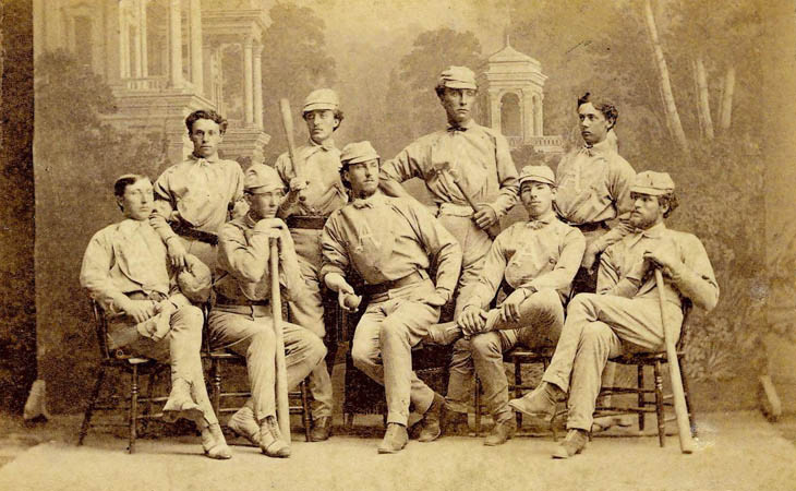 Baseball history photo: The 1869 Antioch College Club which was beaten by the Red Stockings 45-10 on October 24, 1869 in Yellow Springs, Ohio. Front row (L to R): Hod Frost, Right Field; Thad Carr, Catcher; Hugh Taylor Birch, Pitcher; Arthur Elliott Third Base; Dan Stone, Left Field.  Back Row (L to R): Cliff Bellows, Second Base; Sam Beals, First Base; Matt Corry, Center Field; Edward Felthausen Short Stop.  Click photo to return to previous page.