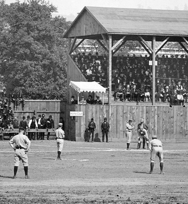 Baseball history photo: Baseball game between Lima (Ohio) and Wheeling (West Virginia), circa 1887. Note the chalked outline of the pitcher's box and the pitcher standing with one foot on the back line of the pitcher's box (a requirement beginning in 1887).  Click photo to return to previous page.