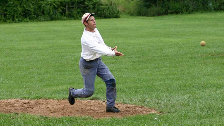 Vintage baseball photo: 8/15/04: Eric “Express” Miklich pitches for the Knickerbocker Club during an 1864 match at Old Bethpage Village Restoration.  Photo by Bill Staskel. Click photo to return to previous page.